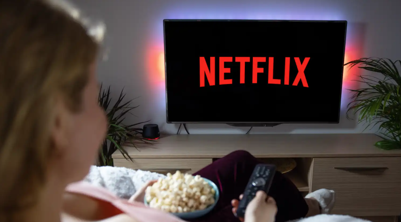 A Person Watching Netflix on a TV