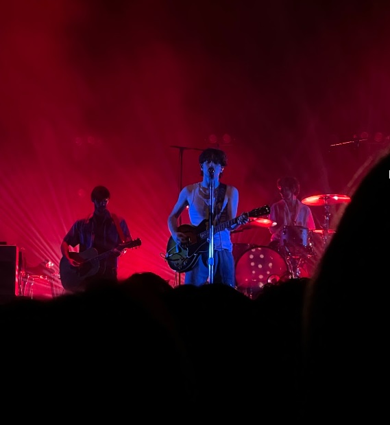 picture of three musicians on a stage