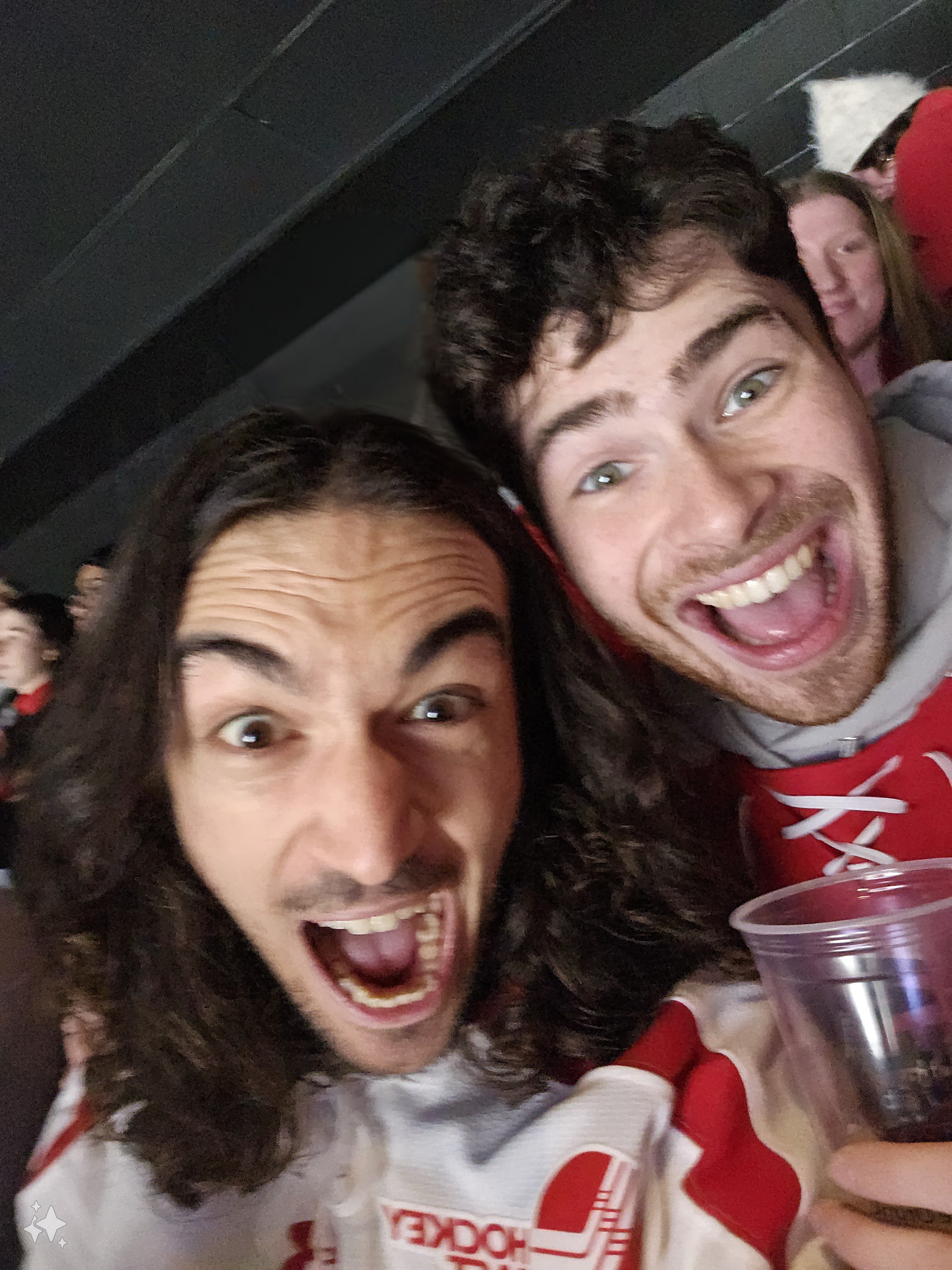 A picture of me and my friend Ethan at a BU hockey game