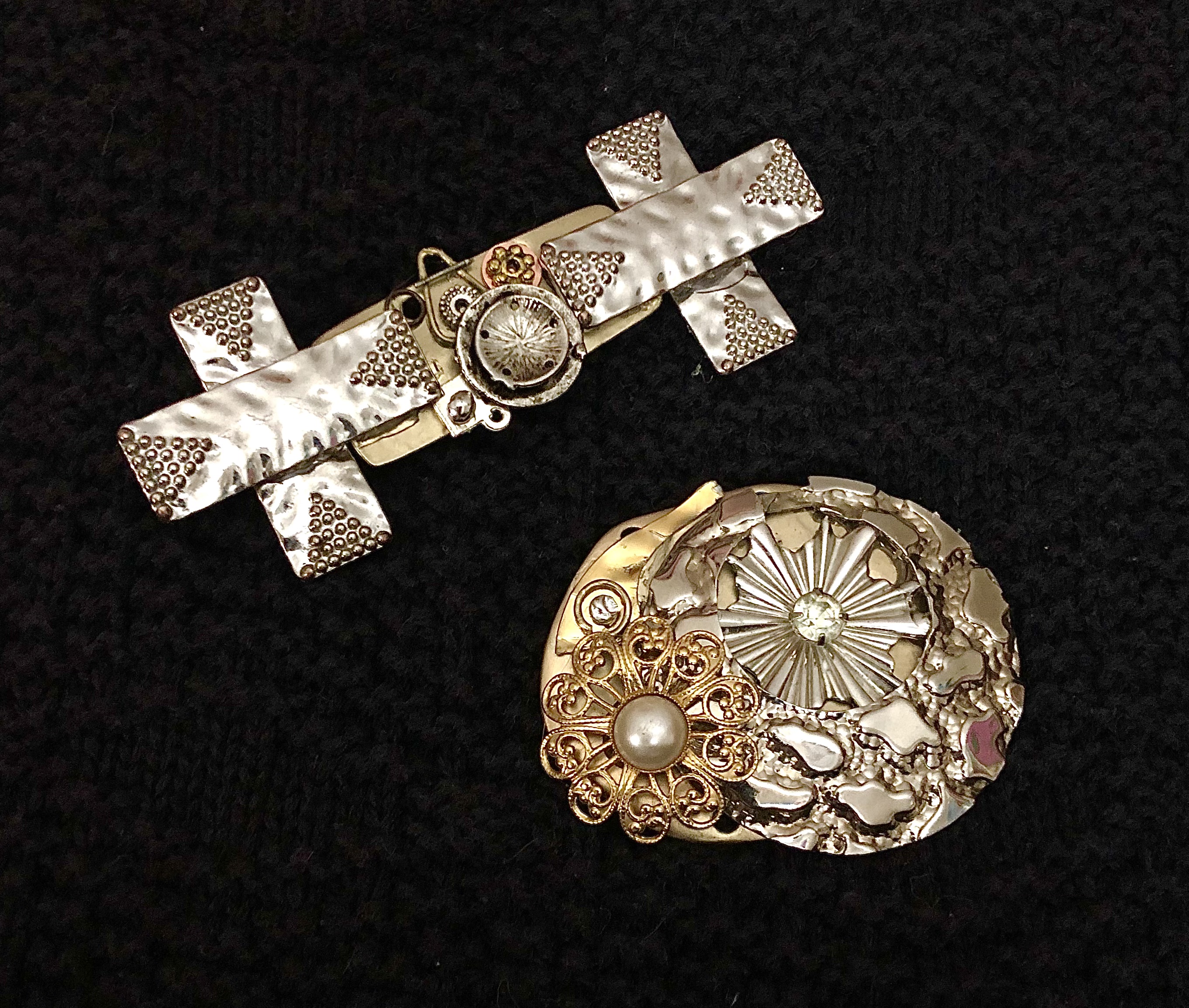 two brooches