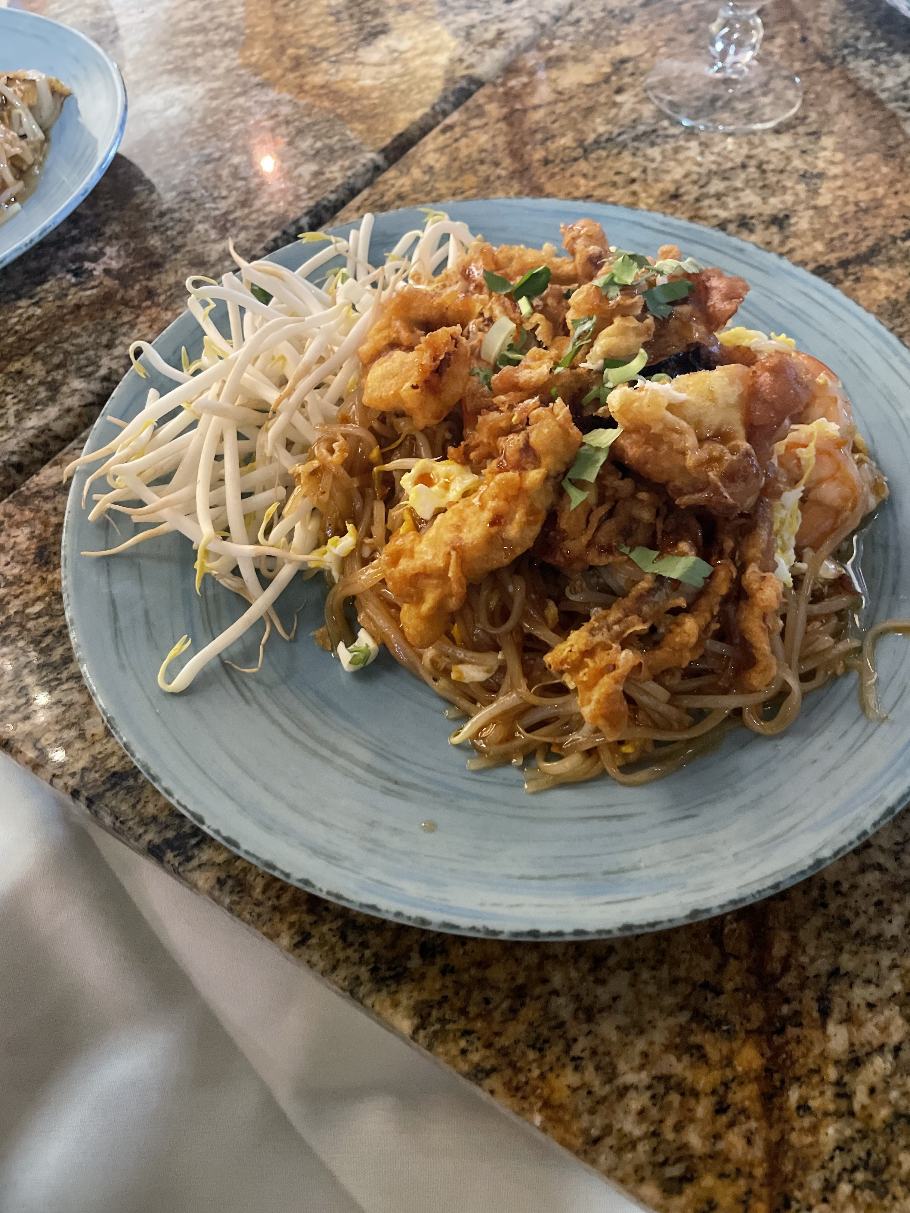 Fried sfot-shell crab over noodles