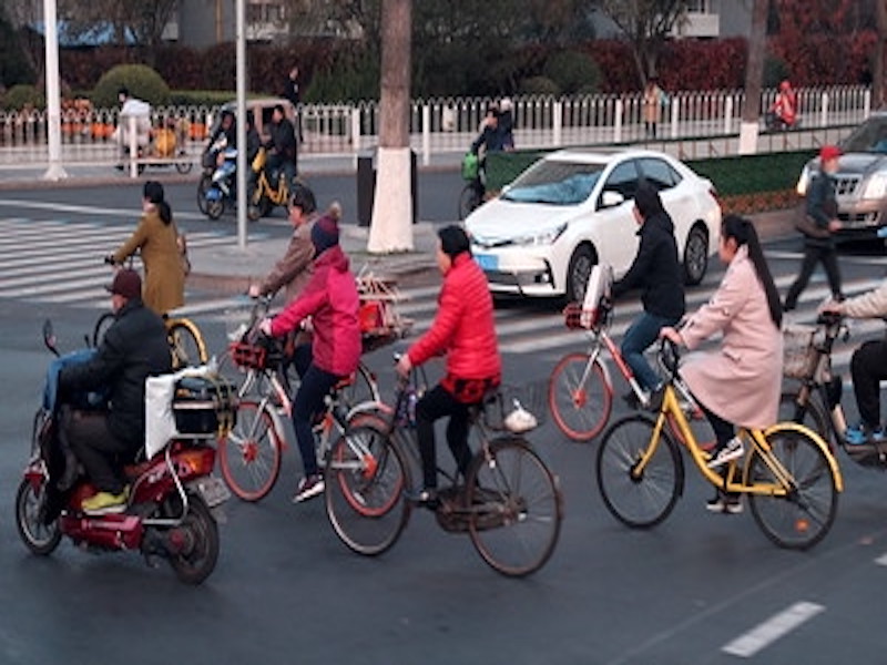 Tianjin citizens riding bike to work
