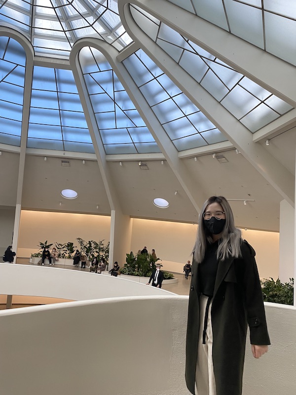 A girl at the top floor of the Guggenheim Museum